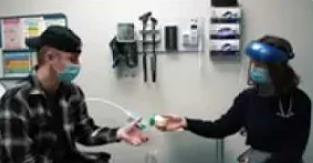 Doctor handing patient a product